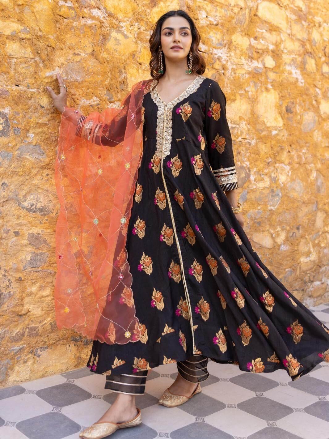 black dress with orange dupatta Black net and orange dupatta Punjabi suit