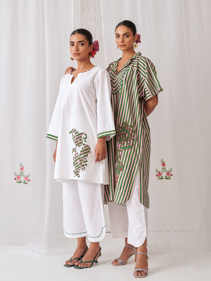 White Short Kurta With Embroidery Paired With Matching Pants With Curved Hemline