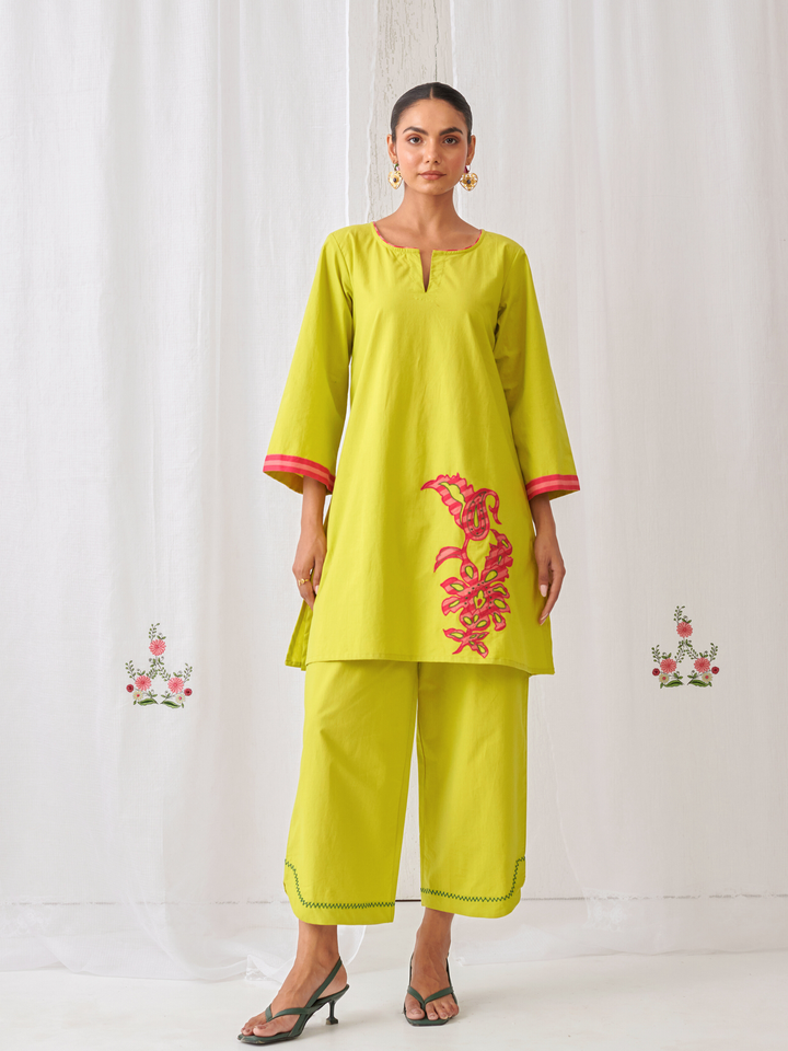 Lemon Short Kurta With Embroidery Paired With Matching Pants With Curved Hemline