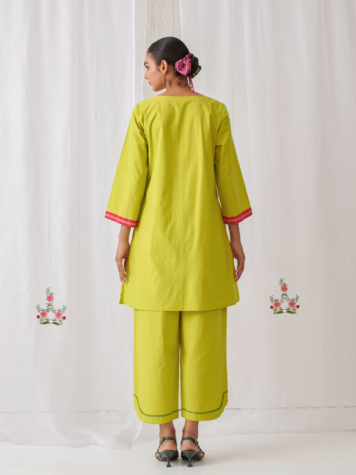 Lemon Short Kurta With Embroidery Paired With Matching Pants With Curved Hemline