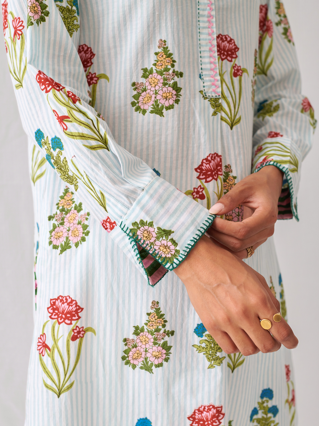 Aqua Floral Short Kurta With Band Collar Paired With White Straight Pants