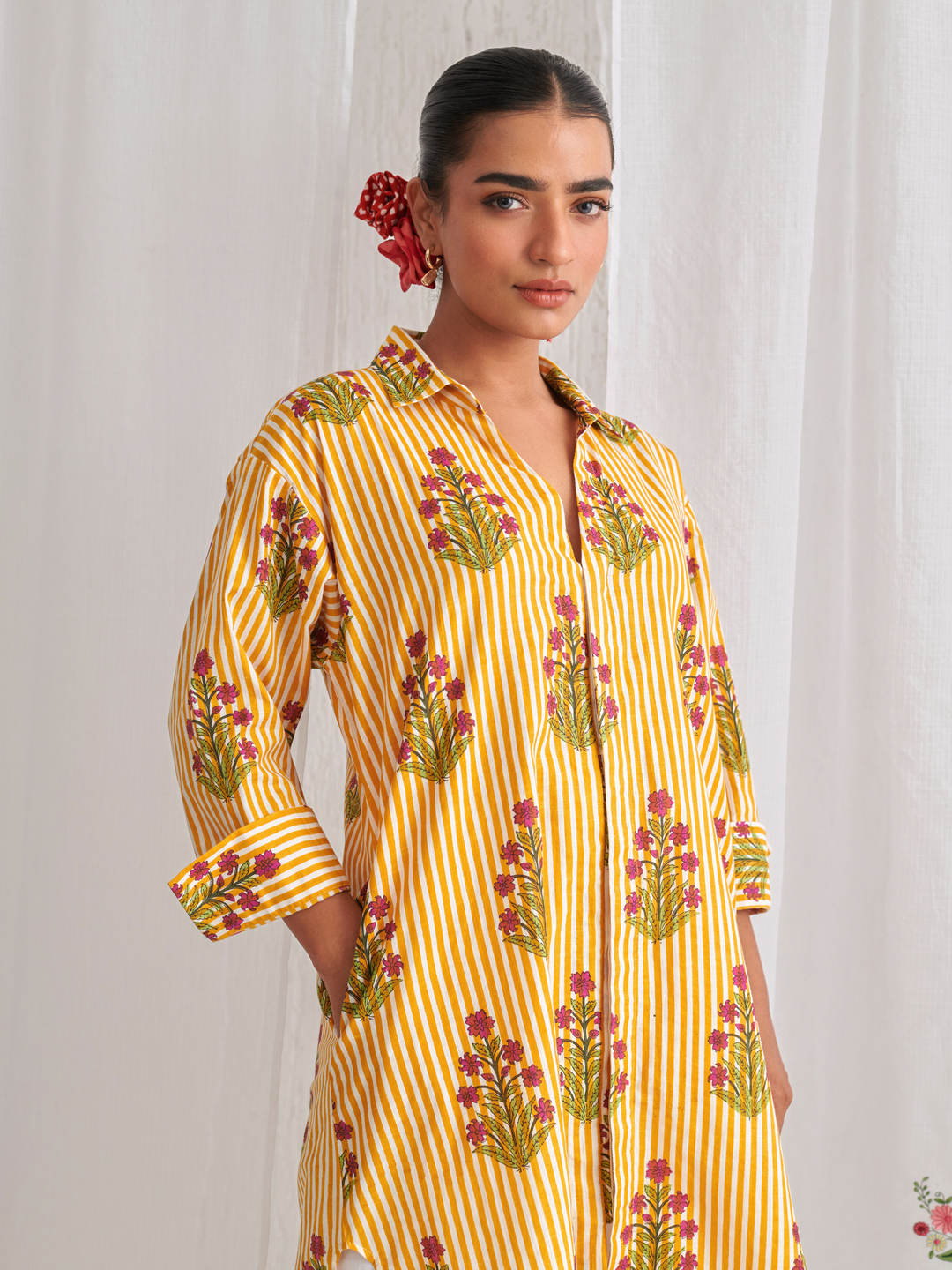 Yellow  Floral Shirt Style Kurta Paired With Curved Hem White Pants