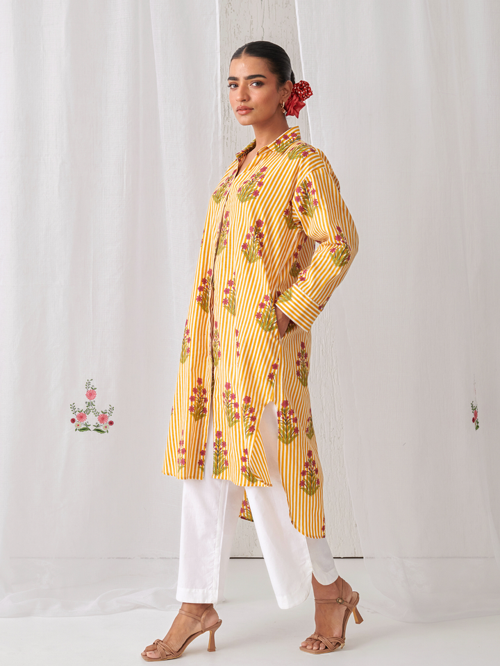 Yellow  Floral Shirt Style Kurta Paired With Curved Hem White Pants