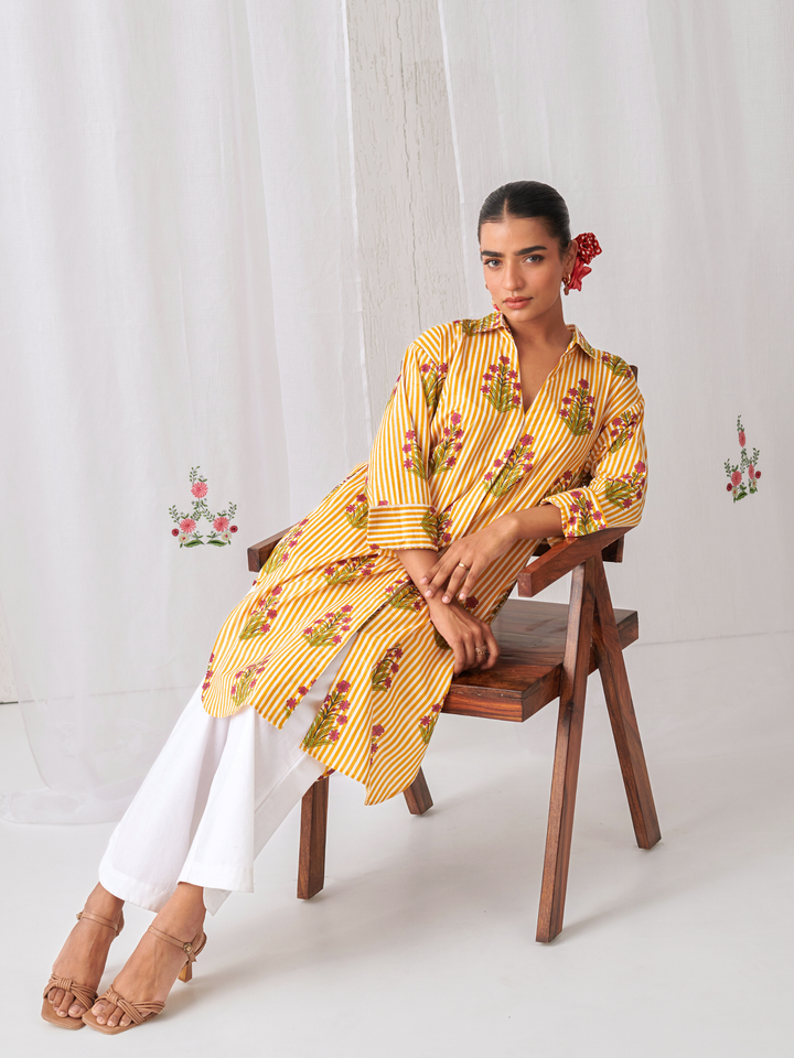 Yellow  Floral Shirt Style Kurta Paired With Curved Hem White Pants
