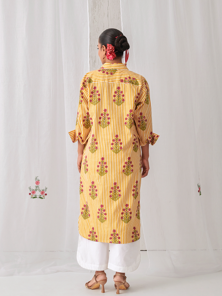 Yellow  Floral Shirt Style Kurta Paired With Curved Hem White Pants