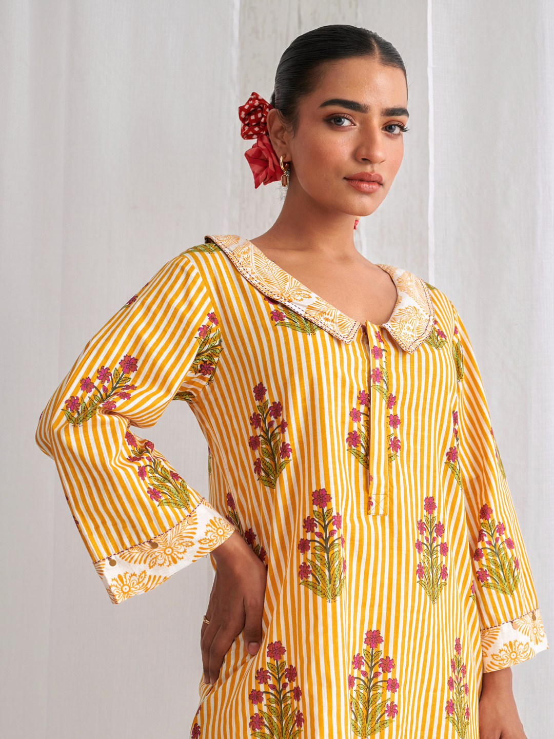 Yellow Floral Collared Short Kurta Paired With Curved  Hem White Pants