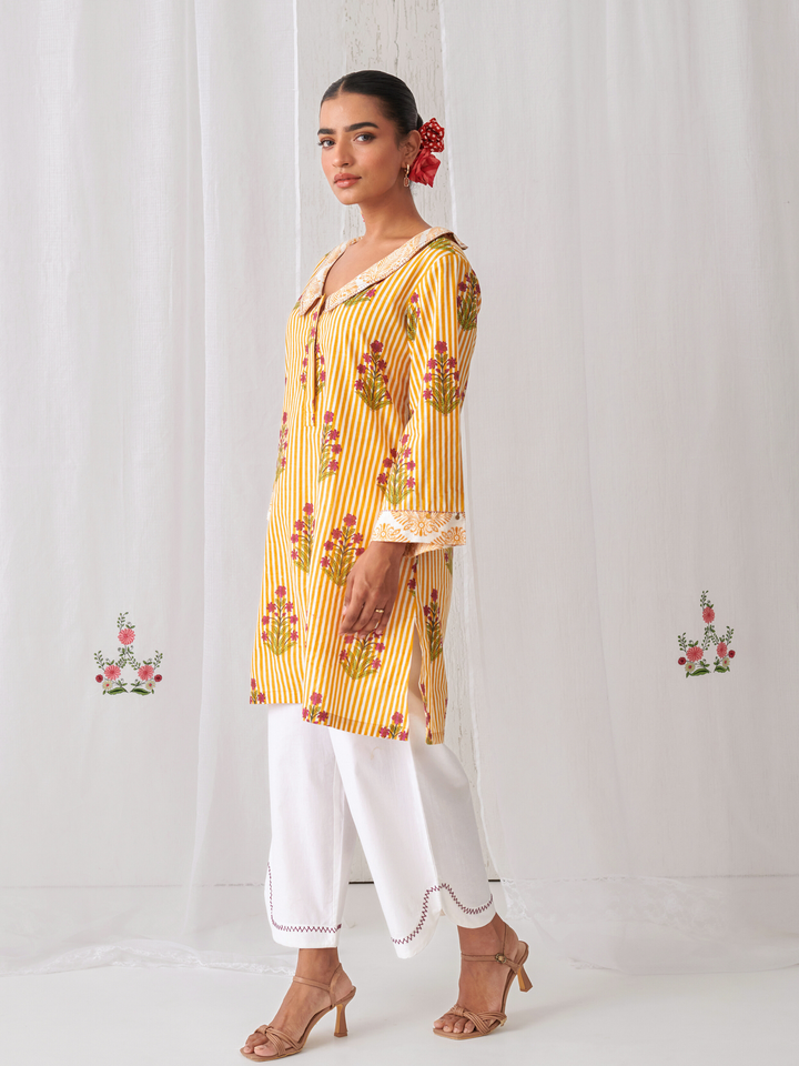 Yellow Floral Collared Short Kurta Paired With Curved  Hem White Pants