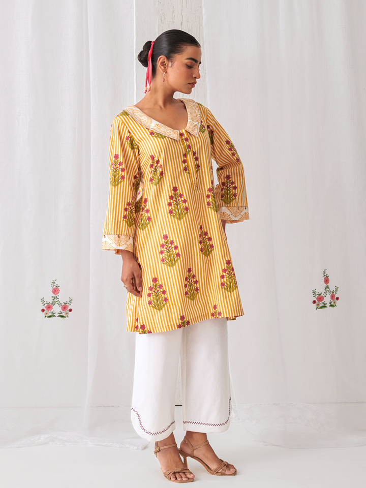 Yellow Floral Collared Short Kurta Paired With Curved  Hem White Pants