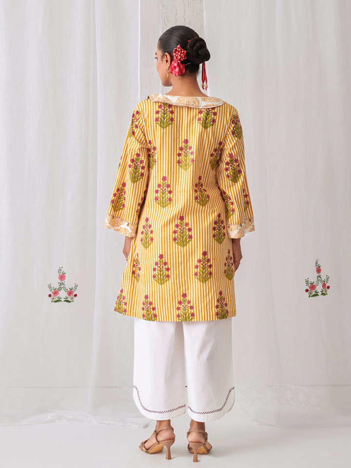 Yellow Floral Collared Short Kurta Paired With Curved  Hem White Pants