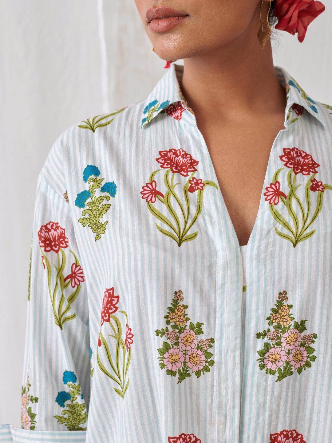 Aqua Floral Shirt Style Kurta Paired With Curved  Hem White Pants