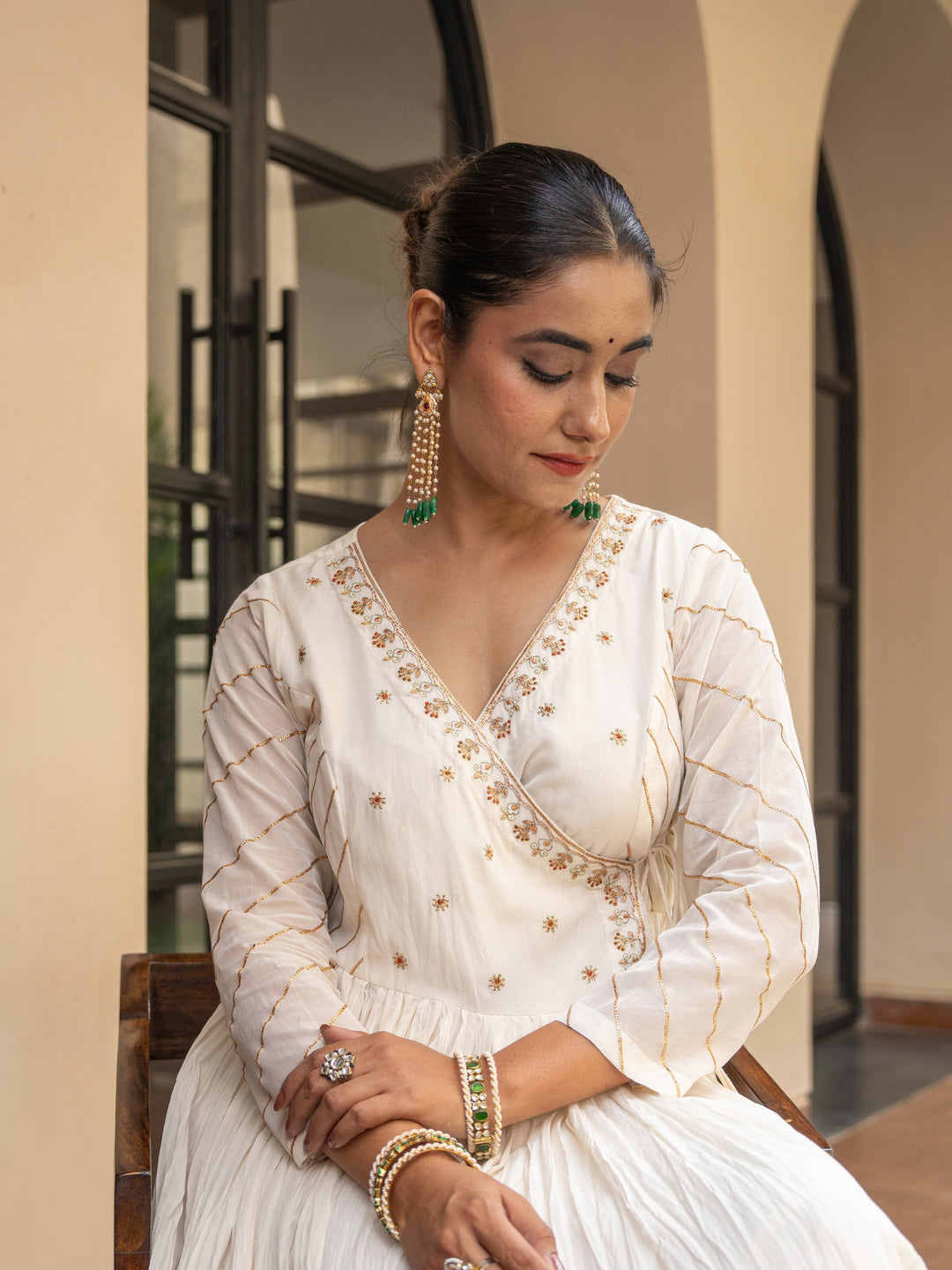 Ivory Angrakha With Embroidered bodice Paired With Matching Pants & Dupatta